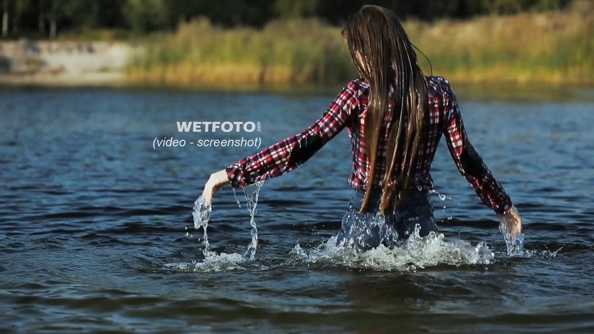 wet girl long haired swim fully clothed water wet clothes jeans shirt tights shoes wet hair lake