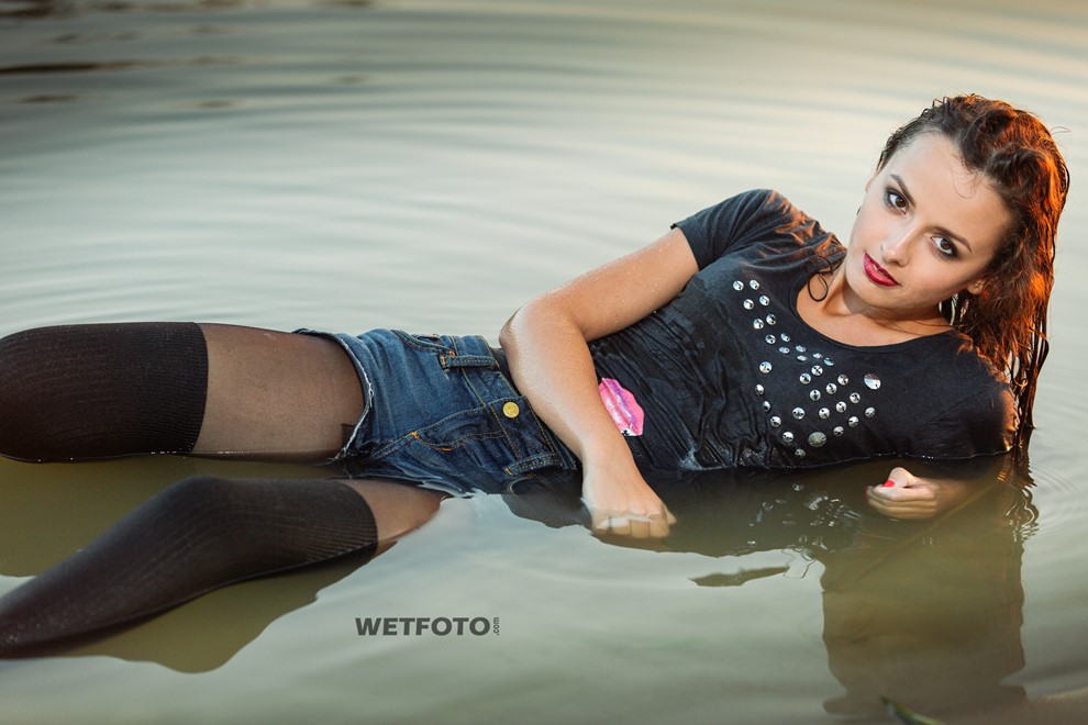 wet girl get wet water t-shirt denim shorts stockings sneakers wet hair soaked