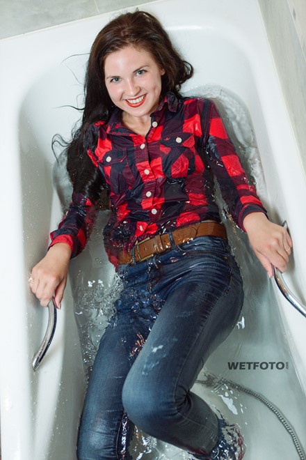 wet girl get wet soaking fully clothed jeans shirt socks wet hair bath