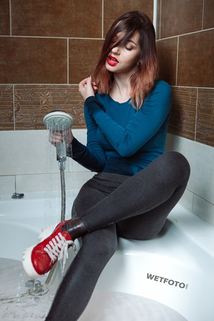 wet girl get wet photo soaking fully clothed bathroom sweater leggings tights shoes