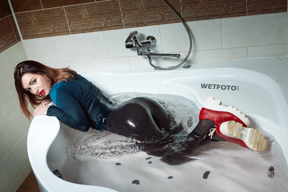 wet girl get wet photo soaking fully clothed bathroom sweater leggings tights shoes