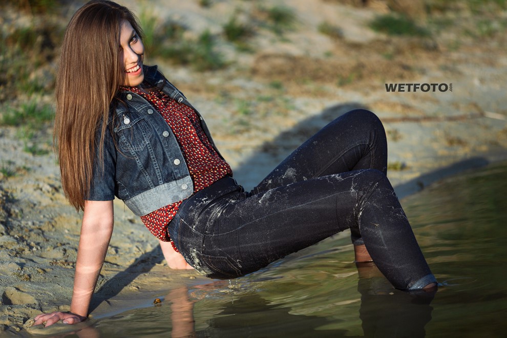 wet girl get wet photo soaked swim clothes skinny jeans jacket blouse high heel shoes lake