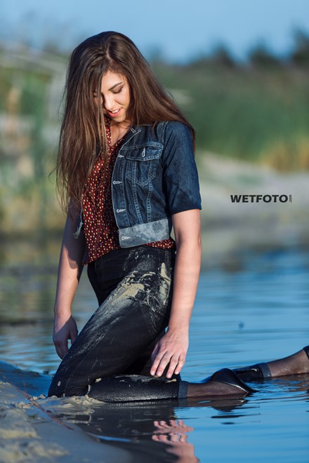 wet girl get wet photo soaked swim clothes skinny jeans jacket blouse high heel shoes lake