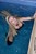 wet girl get wet wet hair fully clothed bustier denim shorts fishnet stockings jackboots high heels jacuzzi