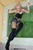 wet girl get wet wet hair fully clothed bustier denim shorts fishnet stockings jackboots high heels jacuzzi