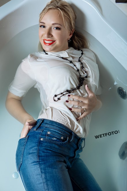 wet girl get wet blonde soaked fully clothed socks blouset jeans shower high heels shoes