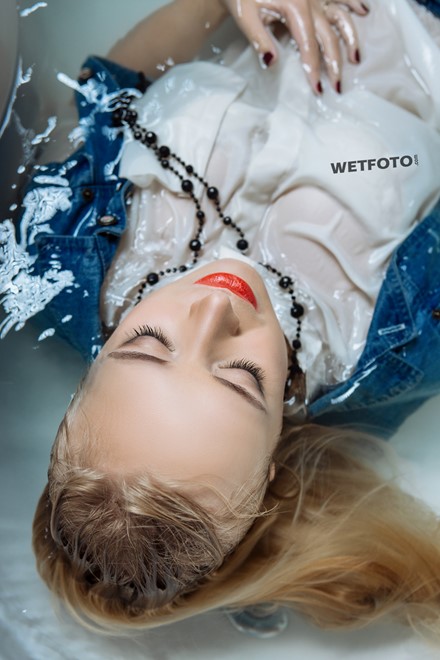 wet girl get wet blonde soaked fully clothed socks blouset jeans shower high heels shoes