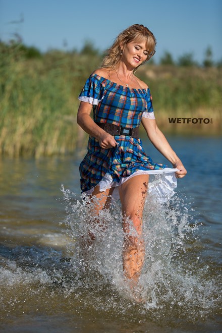 wetlook girl in wet dress