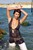 wet woman get wet wet hair fully clothed blouse pants sandals heels sea
