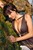 wet woman get wet wet hair fully clothed blouse pants sandals heels sea
