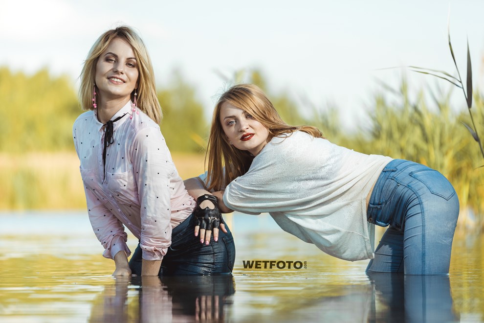 wet girl fully clothed blouse jacket jeans tights water lake