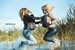 wet girl fully clothed blouse jacket jeans tights water lake