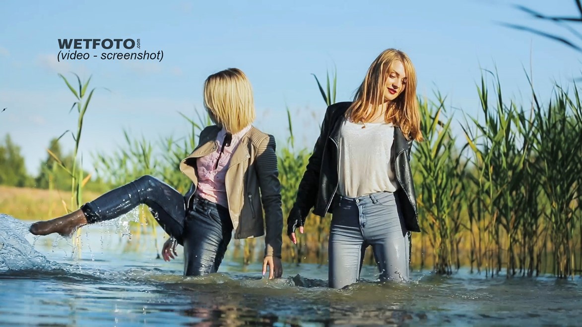 wet girl fully clothed blouse jacket jeans tights water lake