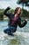 wet girl get wet jacket jeans leather shirt shoes high heels tights fully clothed water swim lake