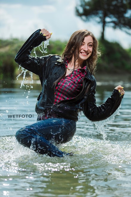 wet girl get wet jacket jeans leather shirt shoes high heels tights fully clothed water swim lake