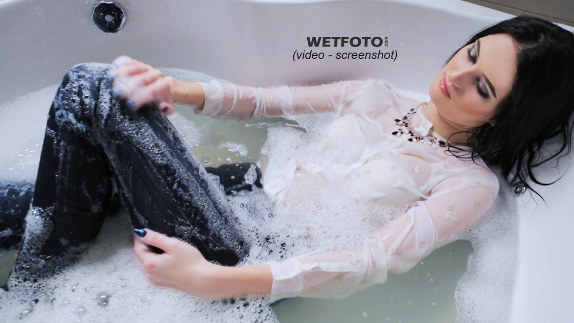 wet girl get wet blouse jeans shoes high heels fully clothed wet hair bath shower