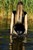 wet girl get wet faux leather jacket bodysuit jeans skirt tights gaiters shoes high heels wet hair lake