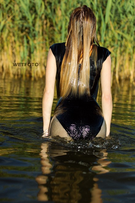 wet girl get wet faux leather jacket bodysuit jeans skirt tights gaiters shoes high heels wet hair lake