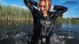 wet girl get wet faux leather jacket bodysuit jeans skirt tights gaiters shoes high heels wet hair lake