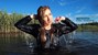 wet girl get wet faux leather jacket bodysuit jeans skirt tights gaiters shoes high heels wet hair lake