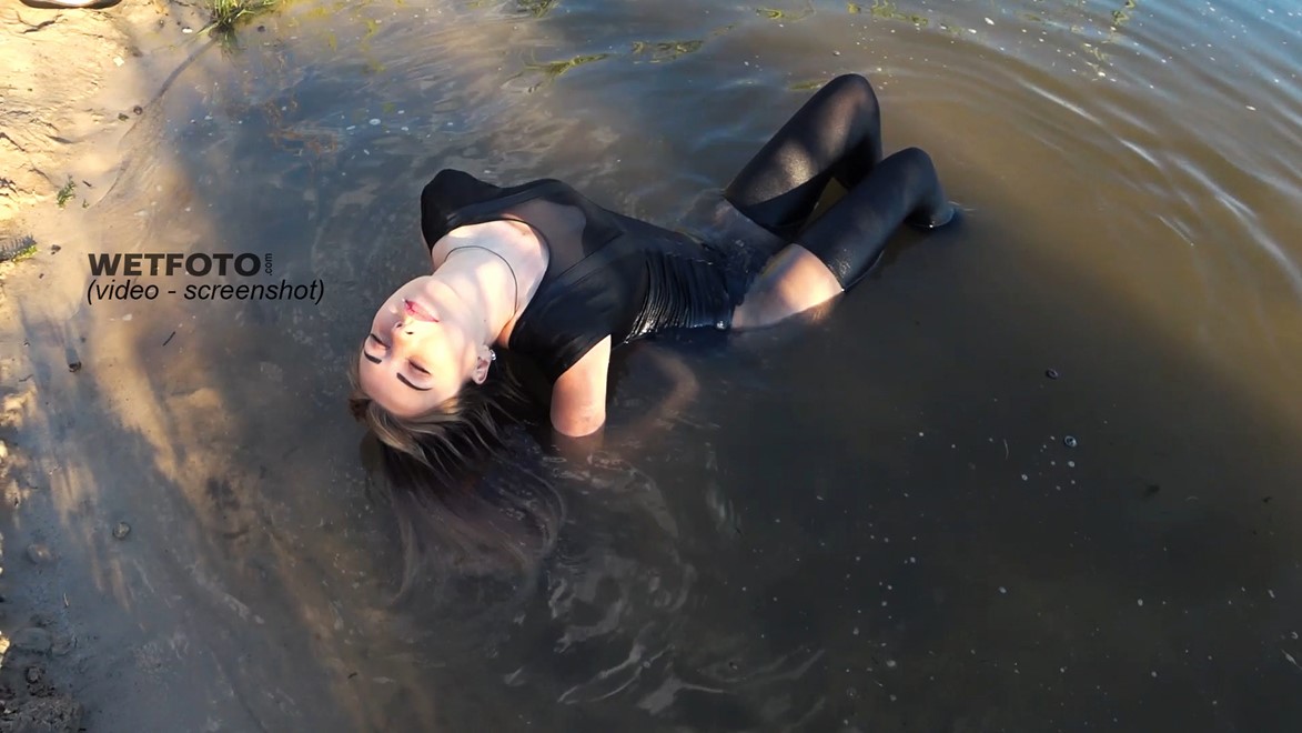 wet girl get wet faux leather jacket bodysuit jeans skirt tights gaiters shoes high heels wet hair lake