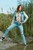 wet girl get wet jacket skinny jeans socks sneakers wet hair lake