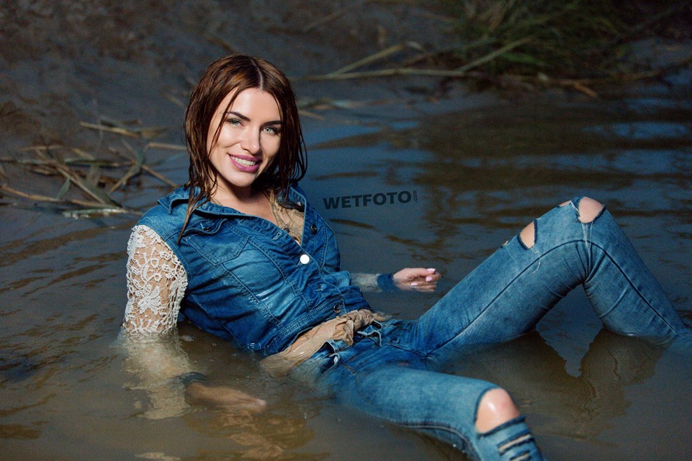 wet girl get wet jacket skinny jeans socks sneakers wet hair lake