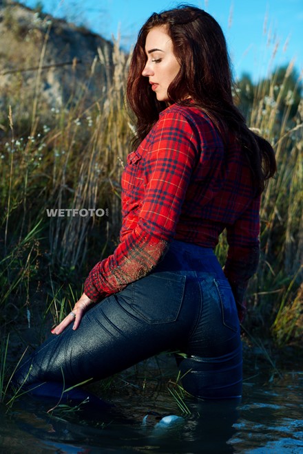 wet girl get wet jeans t-shirt tights shirt sneakers fully soaked water bath swim
