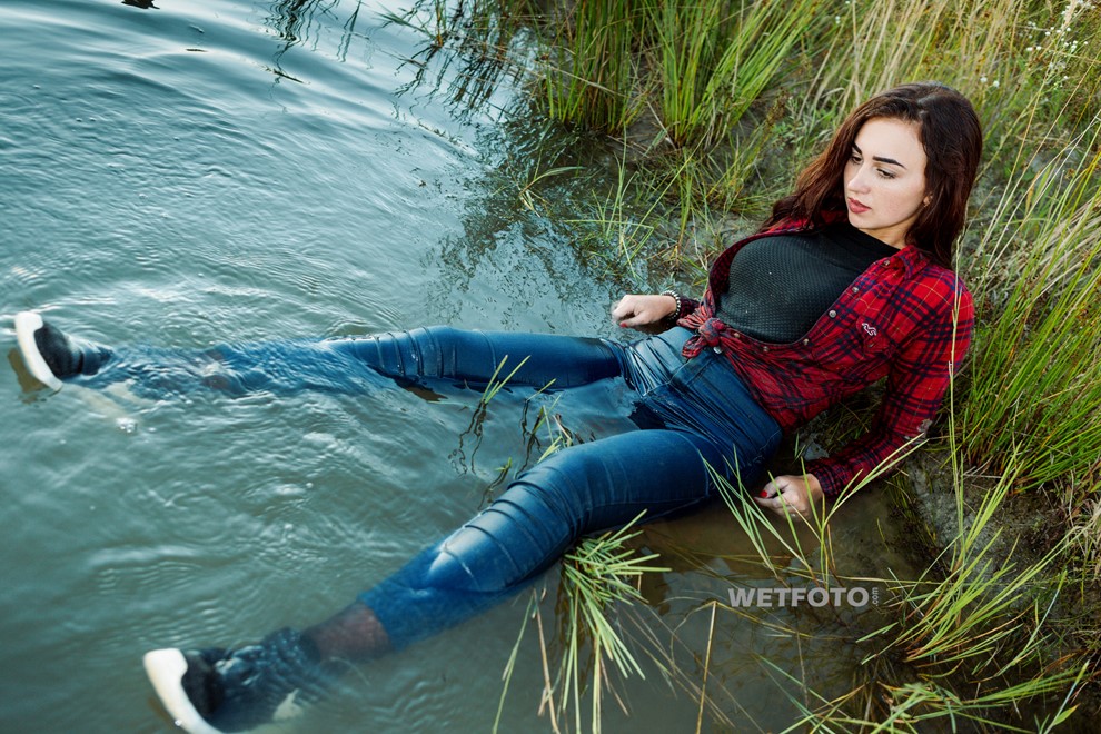 wet girl get wet jeans t-shirt tights shirt sneakers fully soaked water bath swim