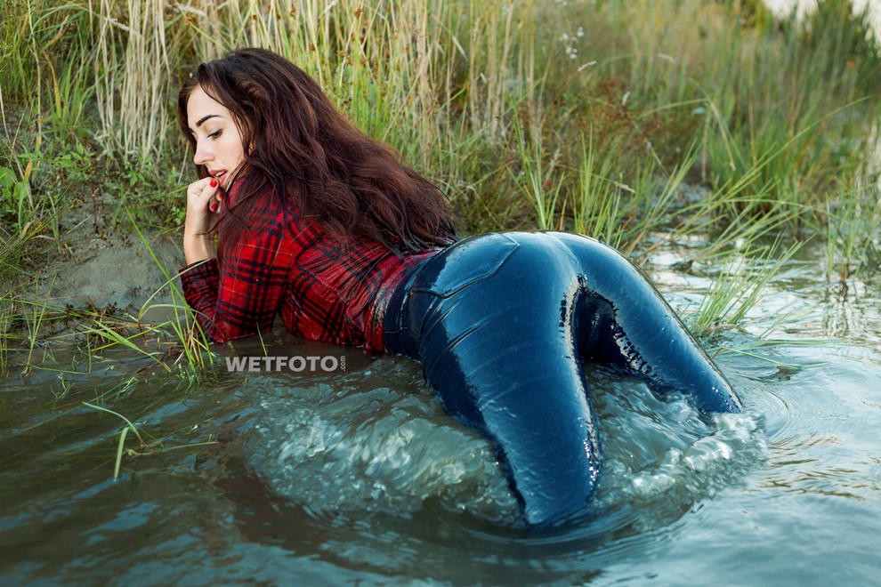 wet girl get wet jeans t-shirt tights shirt sneakers fully soaked water bath swim