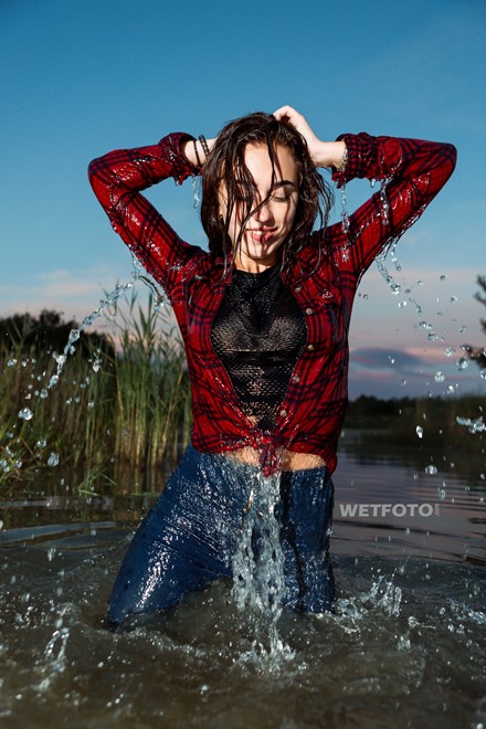wet girl get wet jeans t-shirt tights shirt sneakers fully soaked water bath swim