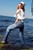 wet girl get wet wet hair fully clothed jacket jeans top baseball cap shoes sea
