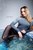 wetfoto swimming fully clothed wetlook model in pool underwater
