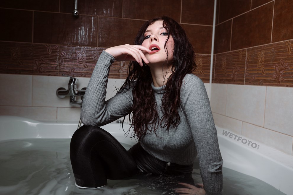wetfoto wetlook girl wet winter clothing shiny disco pants boots