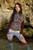 wet girl get wet wet hair swim fully clothed blouse denim shorts boots leather sea