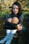 wet girl get wet wet hair swim fully clothed blouse denim shorts boots leather sea