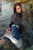wet girl get wet wet hair swim fully clothed blouse denim shorts boots leather sea