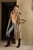 wet girl get wet wet hair fully clothed fur coat sweater jeans hat leather boots jacuzzi