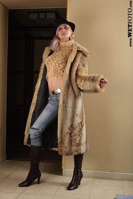 wet girl get wet wet hair fully clothed fur coat sweater jeans hat leather boots jacuzzi