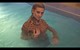 wet girl get wet wet hair fully clothed fur coat sweater jeans hat leather boots jacuzzi