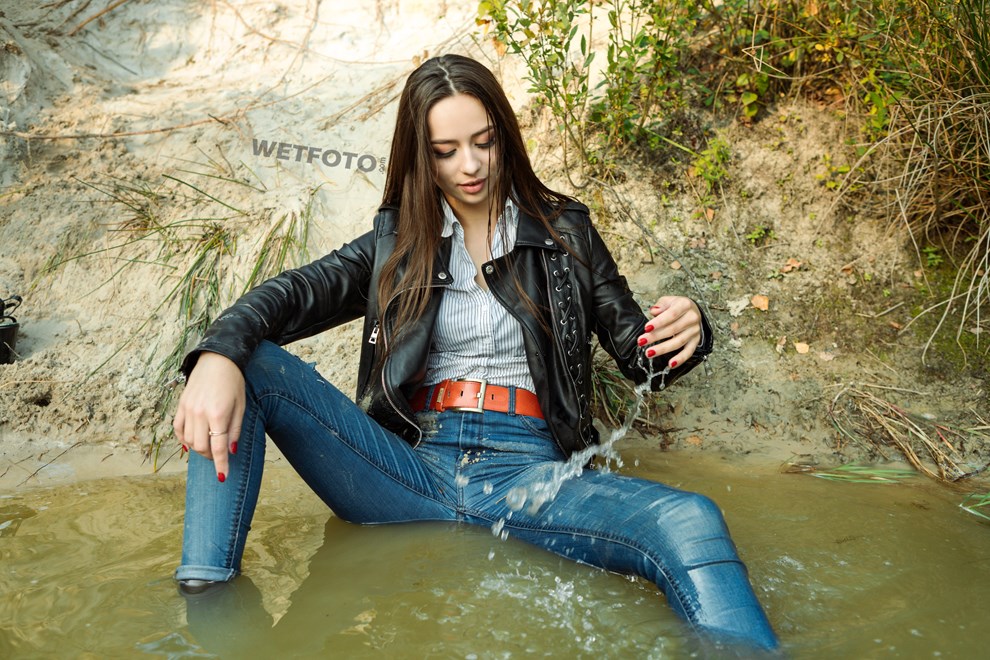 wetfoto girl fully clothed get wet swim blue jeans