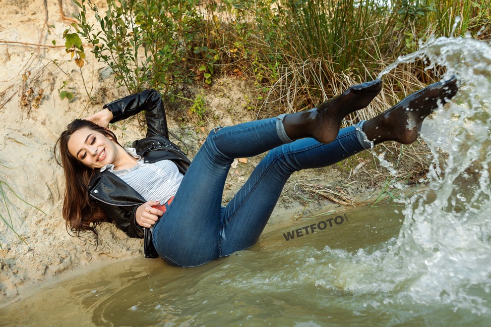 wetfoto girl fully clothed get wet swim blue jeans