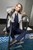 wetfoto woman swims pool fully clothed winter coat