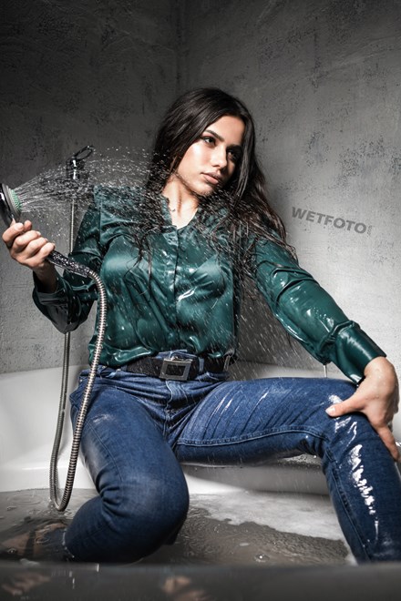 hot girl takes bath jeans shirt wetfoto wetlook