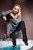 blonde wetlook woman gets wet dressed pants sweater tights