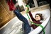wetlook girl get wet clothed slim jeggings red socks