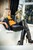blonde girl makes lether pants hoodie completely wet wetfoto