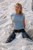 wet girl get wet wet hair fully clothed t-shirt jeans sea