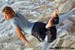 wet girl get wet wet hair fully clothed t-shirt jeans sea