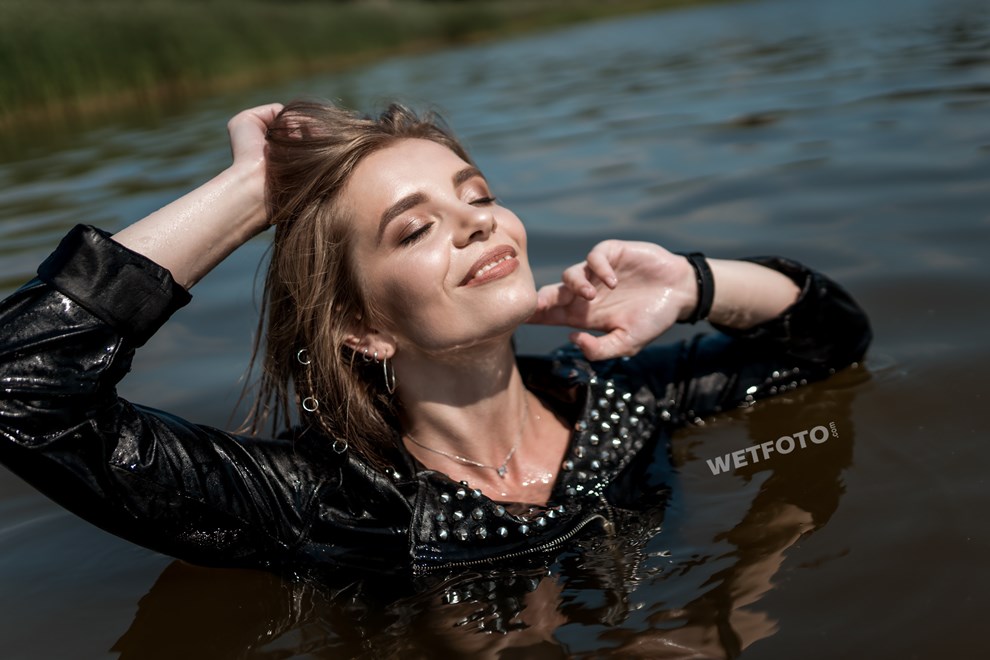 wetfoto wet fully clothed girl skinny jeans bodysuit